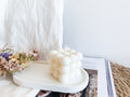 Handmade Bubble Soy Candle in white wax displayed as modern home décor.